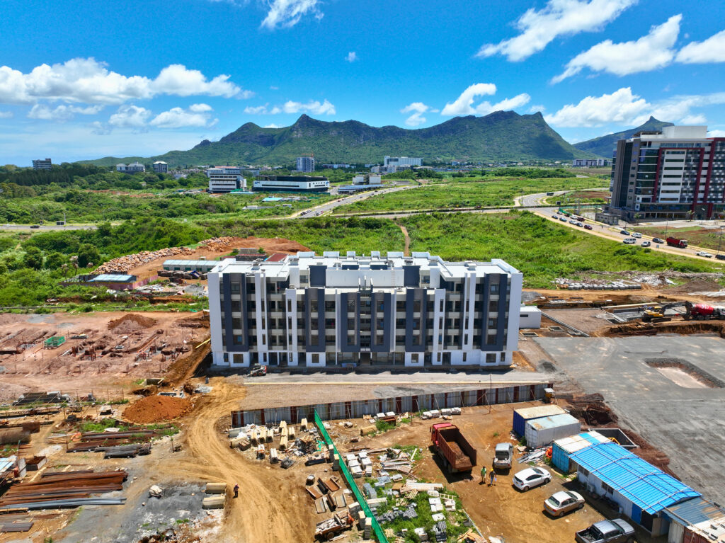 Professional and modern office spaces and premium residences at The Docks, offering flexible work environments and luxurious living in Port Louis and Ebene.
